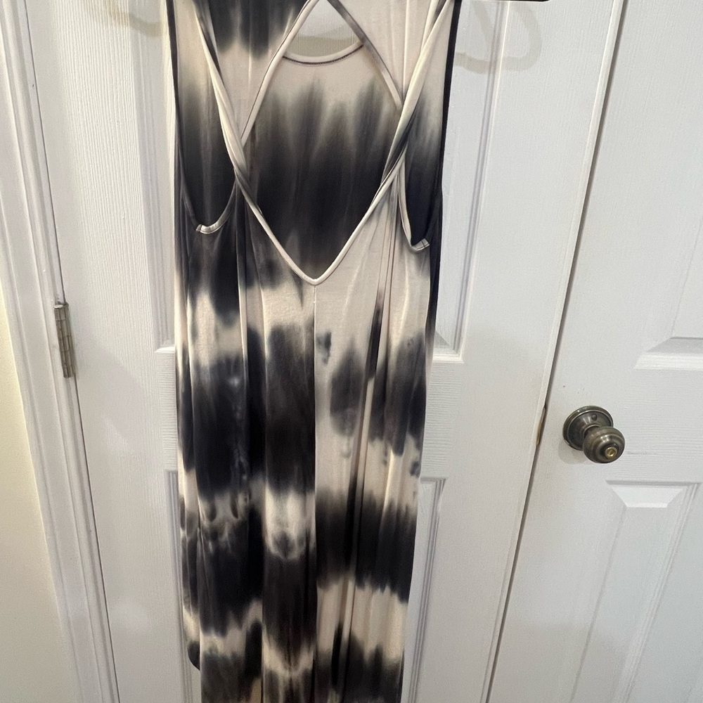 Size small t shorter high-low dress. Like new.